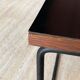 Black "flying" coffee table by Pierre Guariche for Steiner