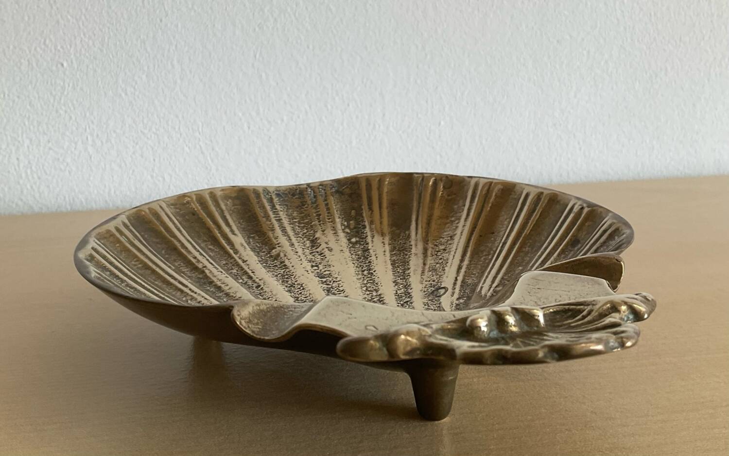 Vintage bronze shell emptier