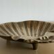 Vintage bronze shell emptier
