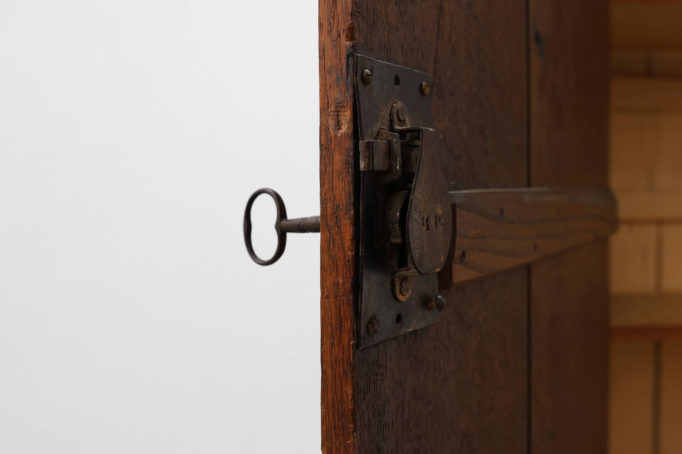 Tall rustic French monastery wardrobe in oak from the late 19th century