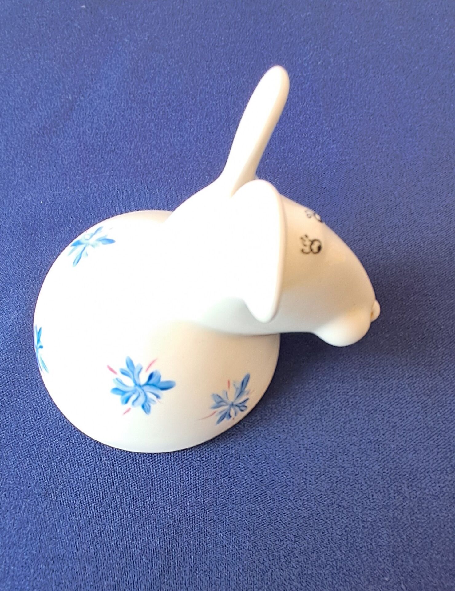 Salt cellar or porcelain salt shaker. Zoomorphic figurine of a mouse.