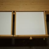 Small bamboo desk with three drawers.