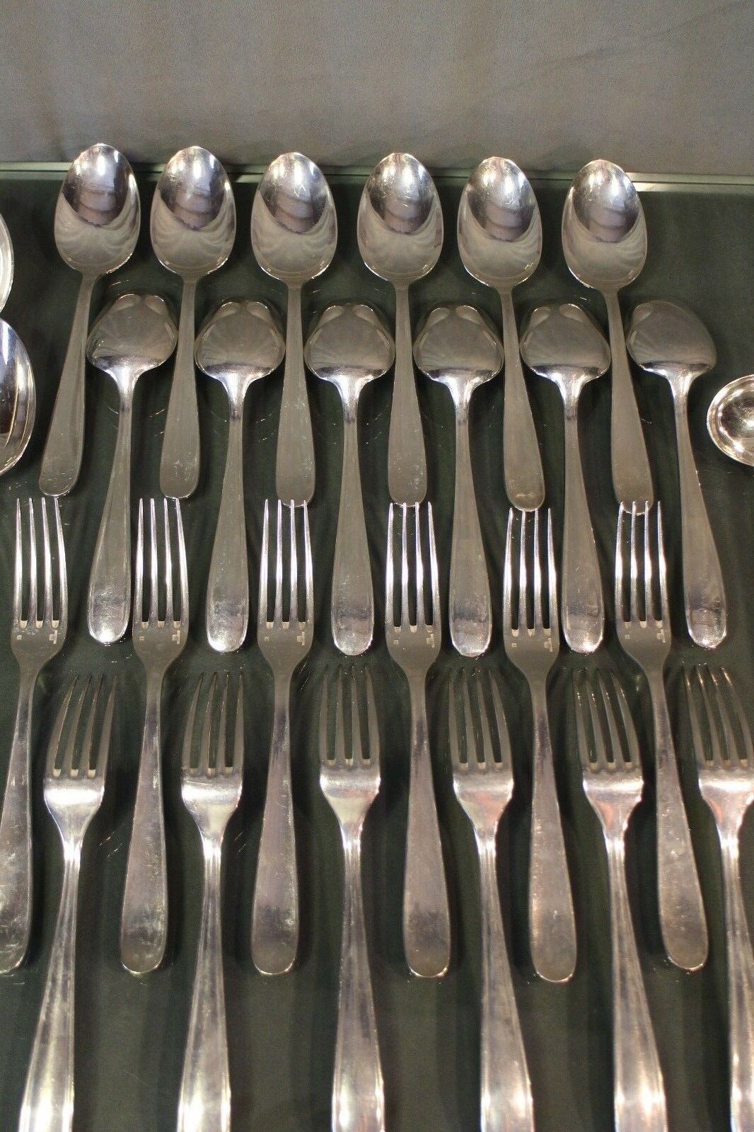 Silver metal housewife signed Christofle spoons and forks