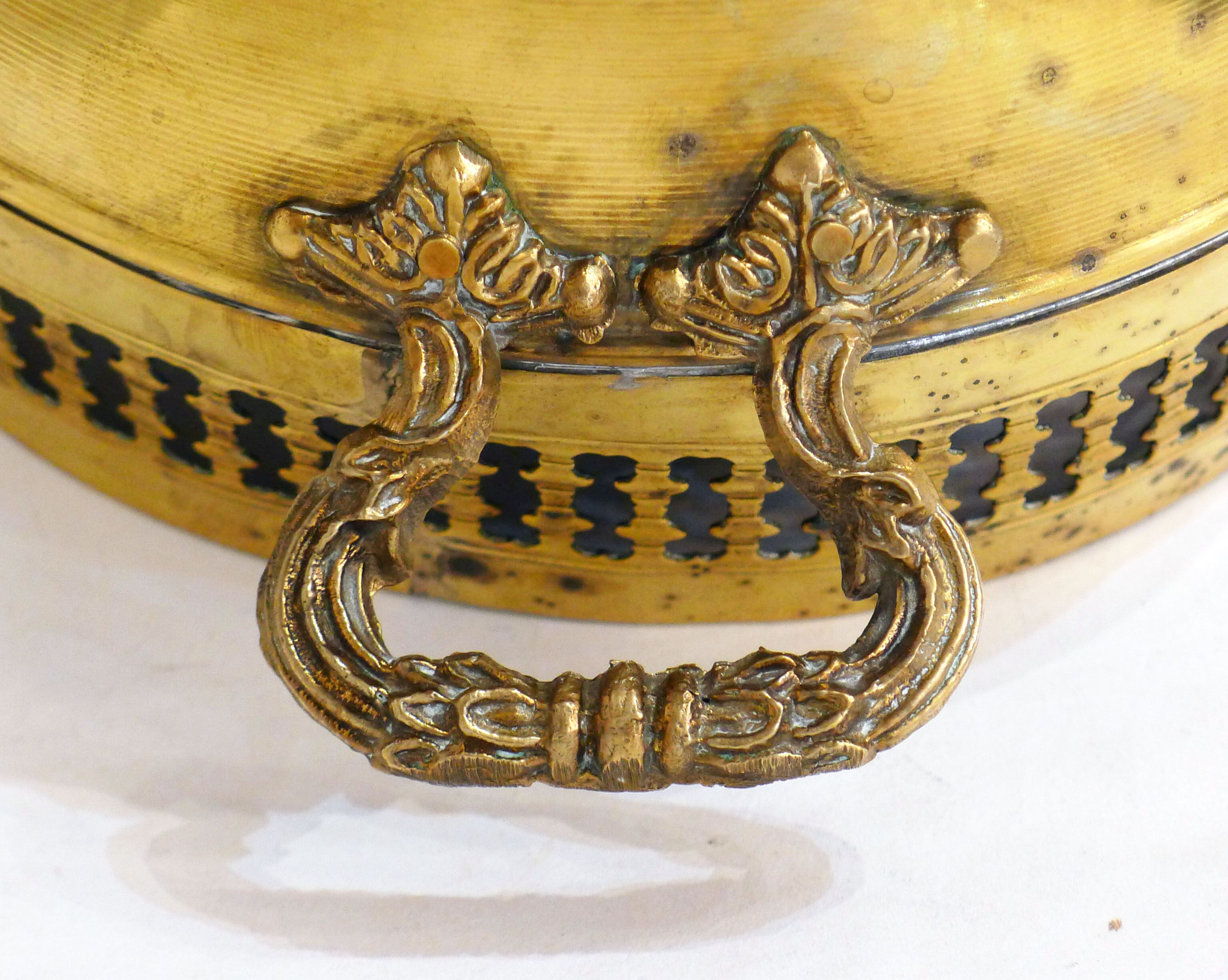 Planter on lion legs, made of golden metal