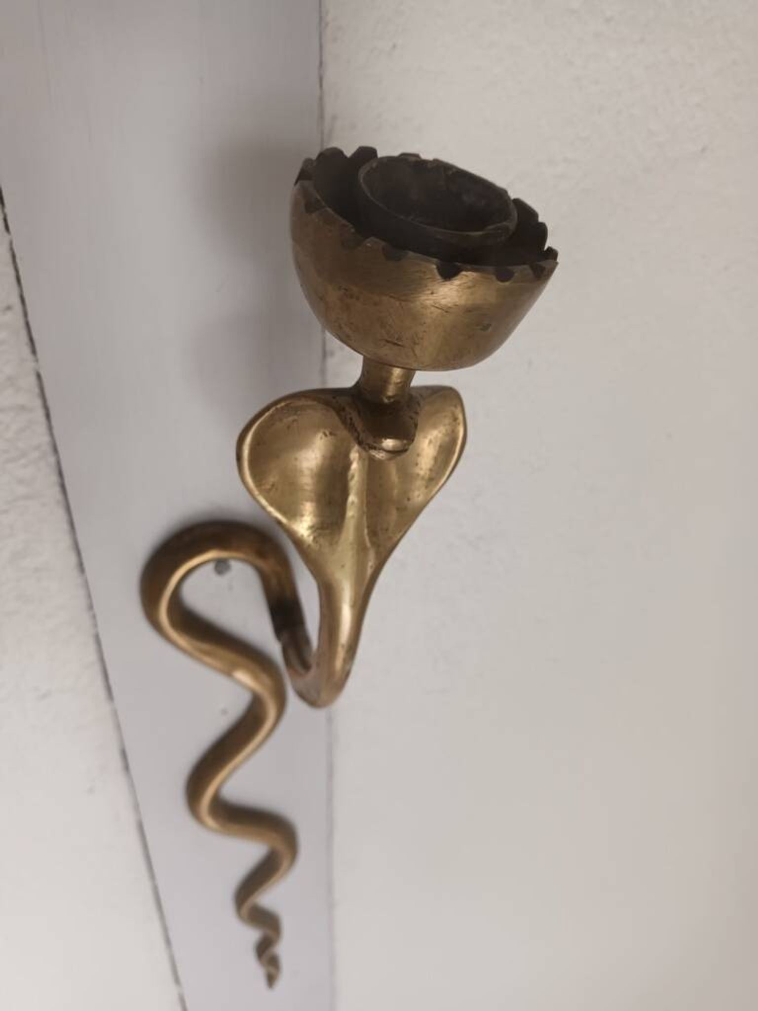 Bronze cobra candle holder wall sconce