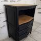 Chiffonnier en bois brut et peint en noir