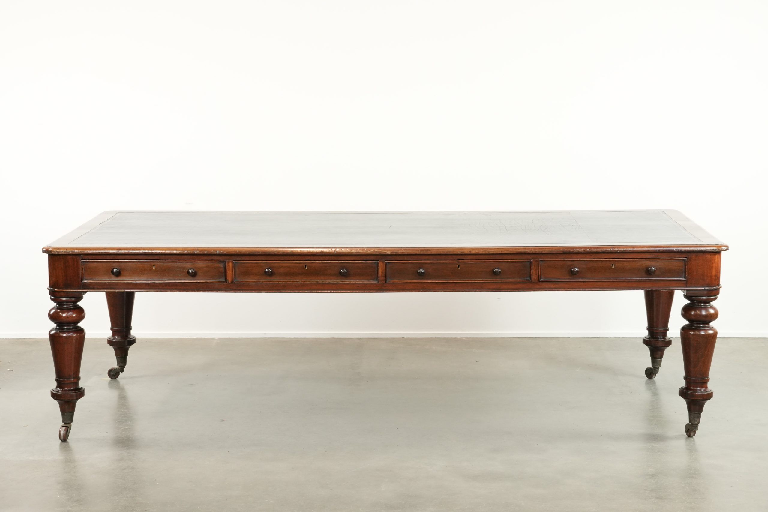 Antique English library table / writing table / desk from the 19th century