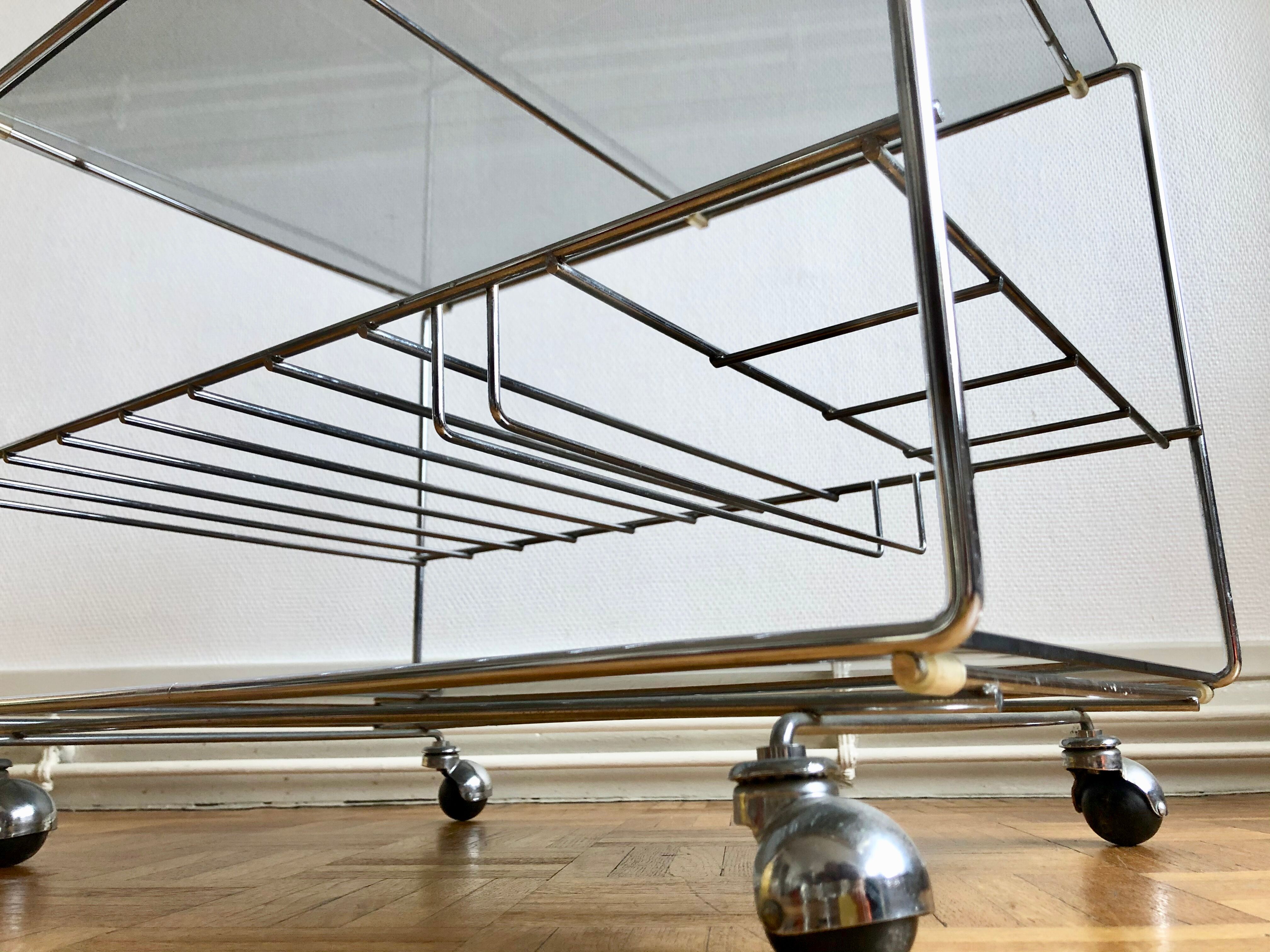 Glass and chrome wheeled vinyl holder