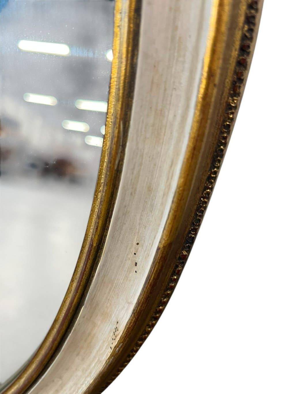 Miroir mural ovale baroque vintage à décor de noeud