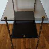 Bronze and glass side table in the 1950s