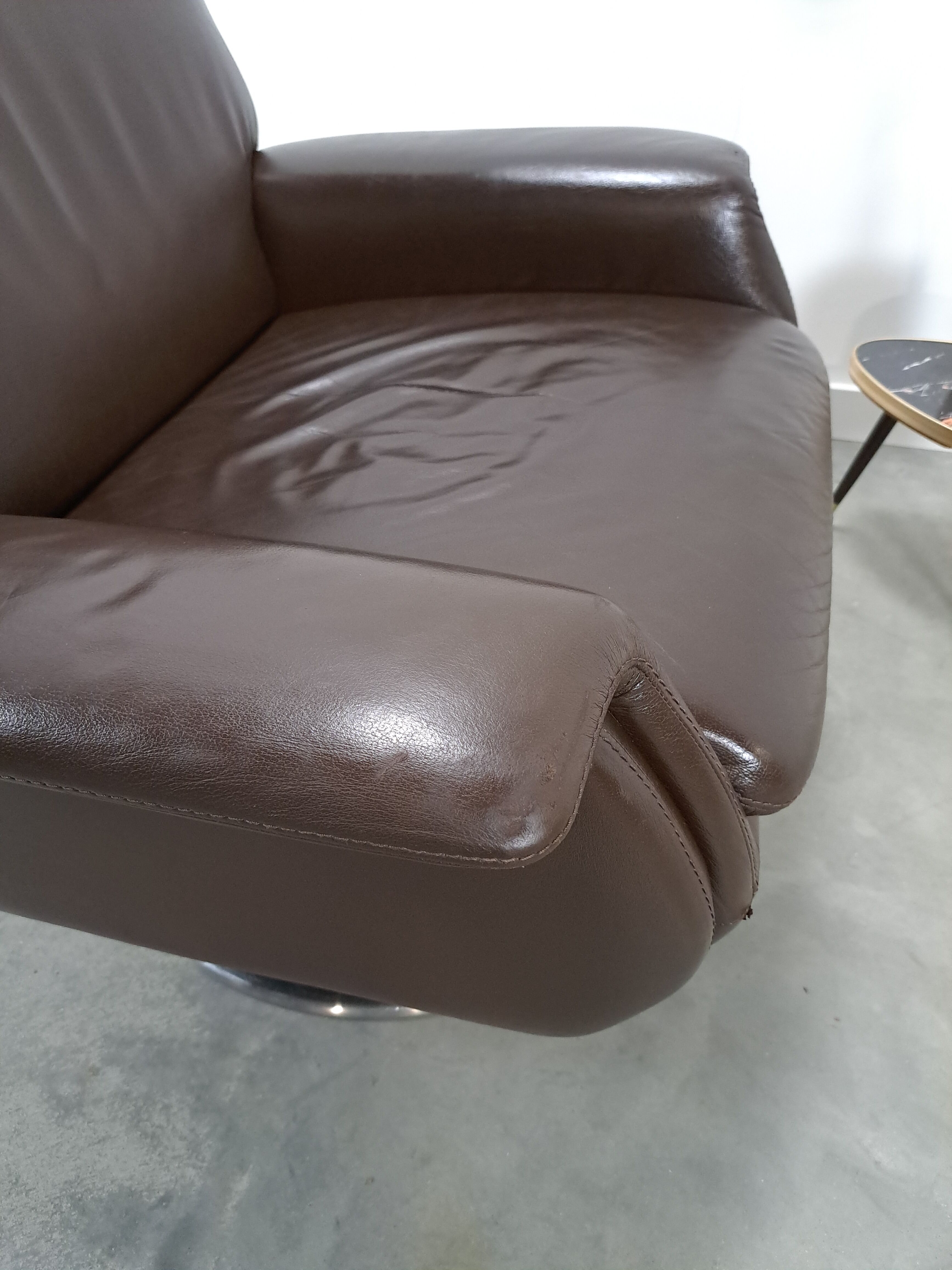 Brown leather swivel chair