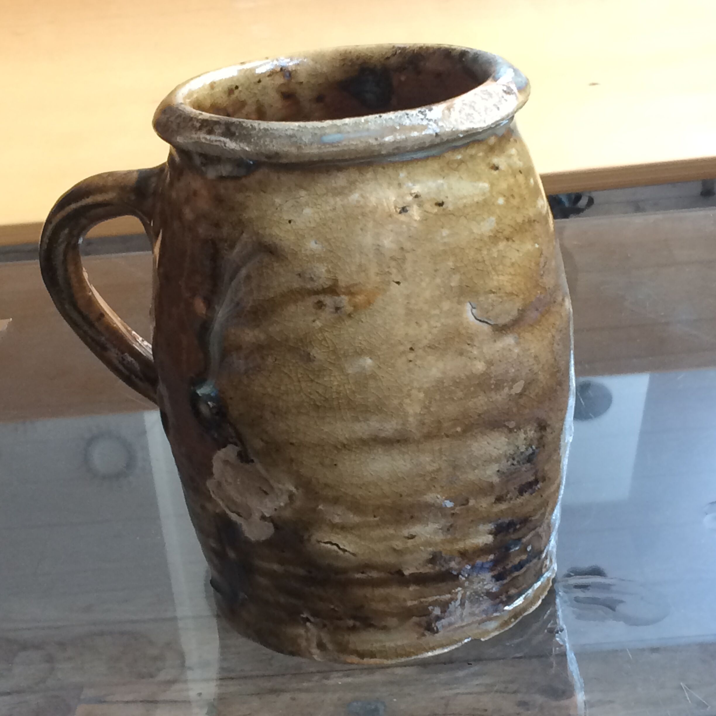 Veneered earth jug
