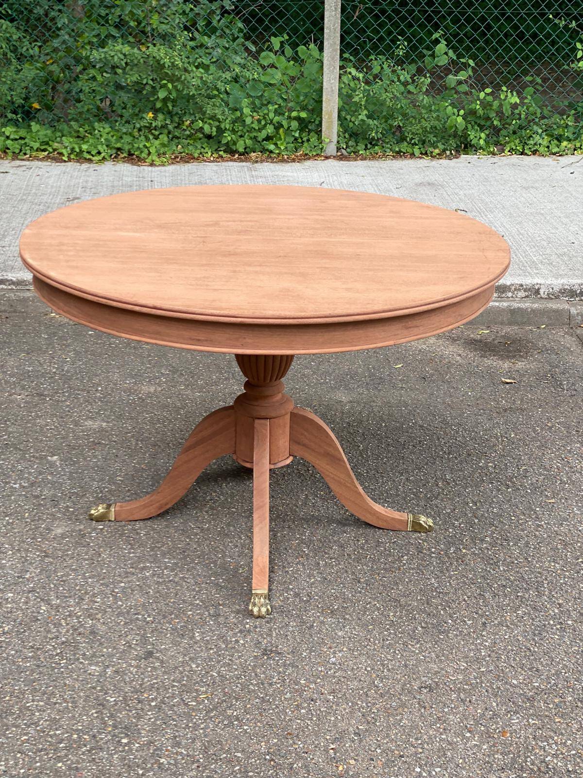 Round extendable dining table in solid mahogany from the 1930s.