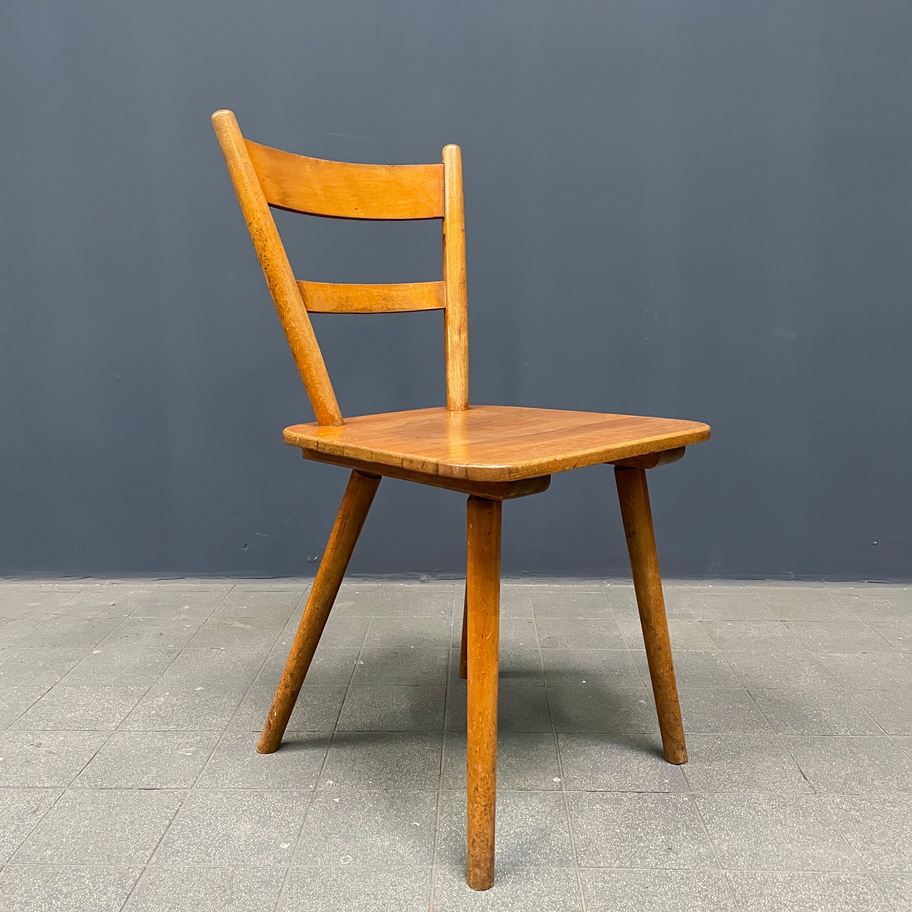 Set of eight german stick chairs from the 1950