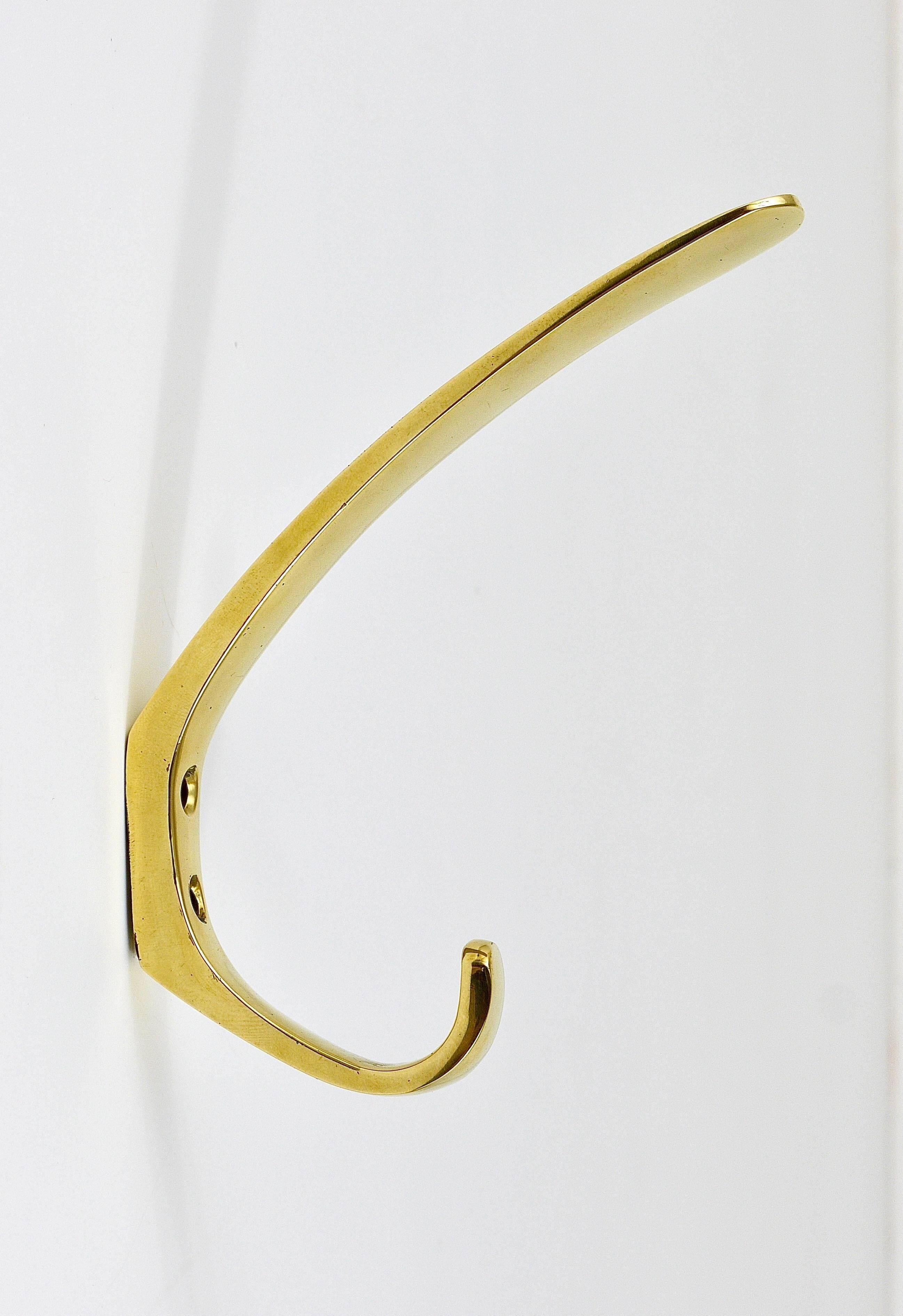 Up to four mid-century brass wall hooks by Herta Baller, Austria, 1950s.