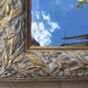Pair of bevelled mirrors in white and gilded wood 86 x 66 cm