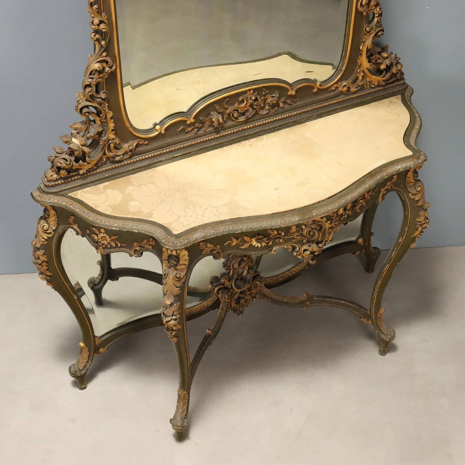 Ancient baroque console with a wooden mirror, Italy, late 19th century.