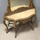Ancient baroque console with a wooden mirror, Italy, late 19th century.