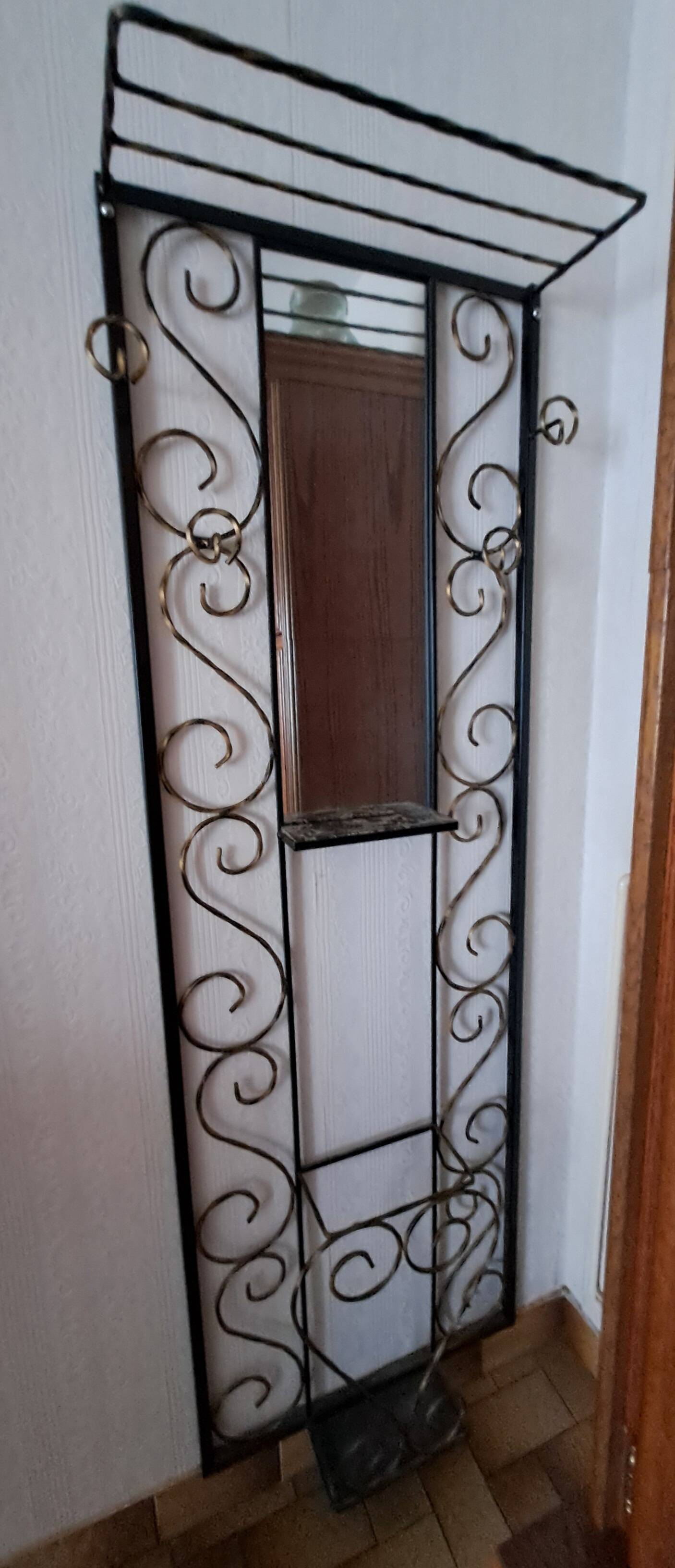 Vintage wrought iron coat rack