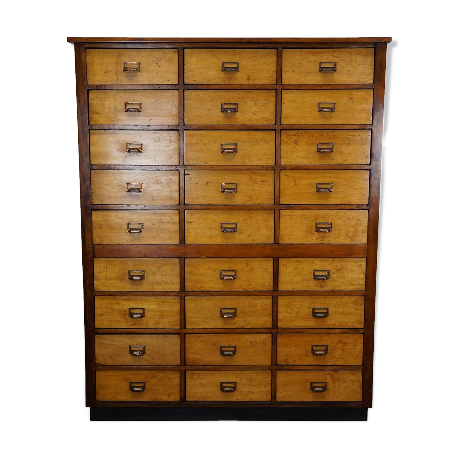 School cabinet bank of vintage Dutch drawers in mid-twentieth century pine