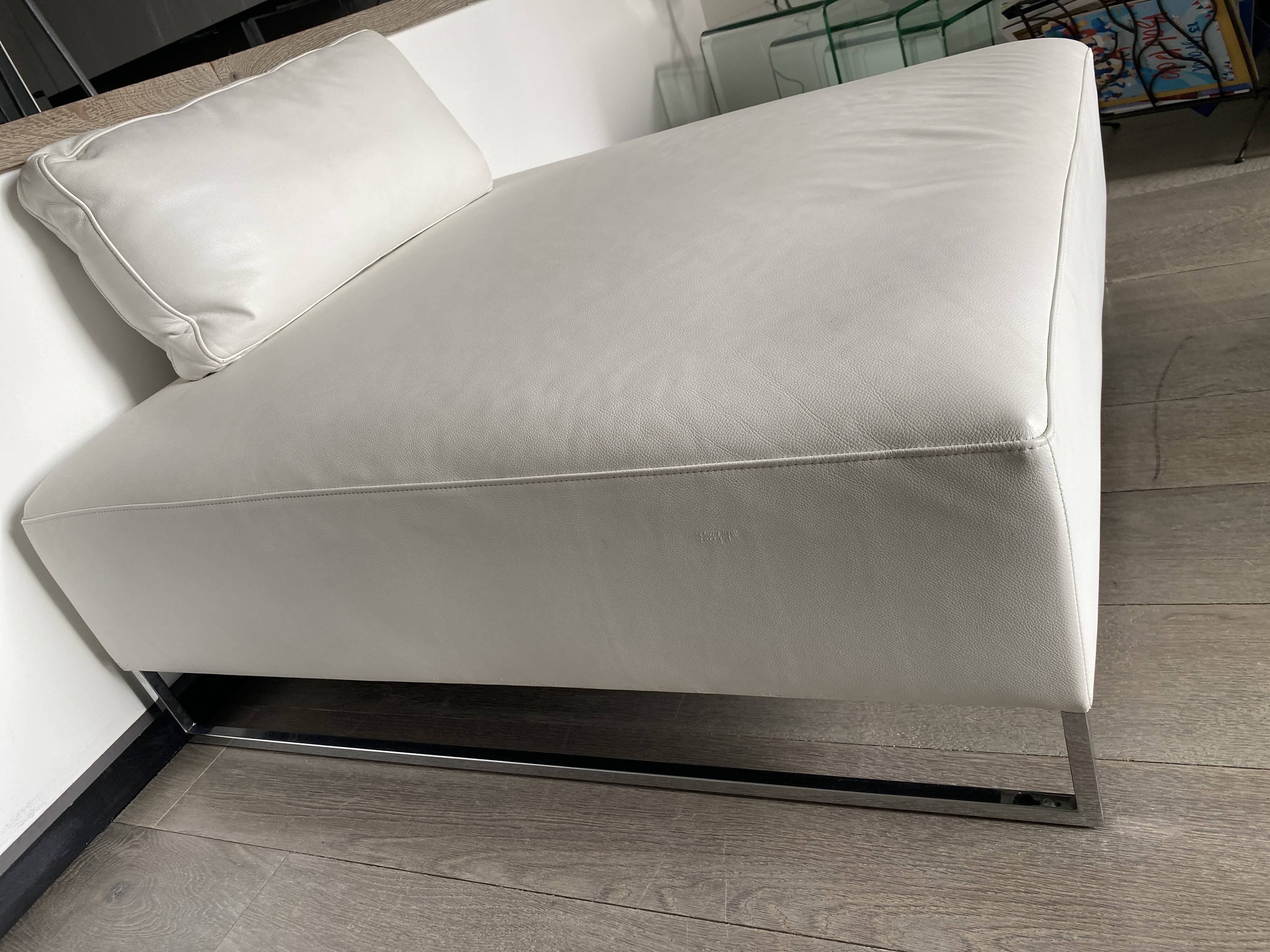 White leather pouf matching Ligne Roset sofa