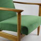 Fauteuil vert par Edmund Homa, années 1970