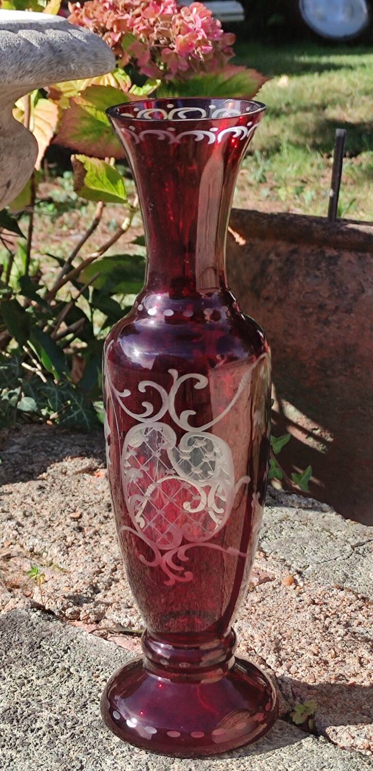 Old engraved red crystal vase