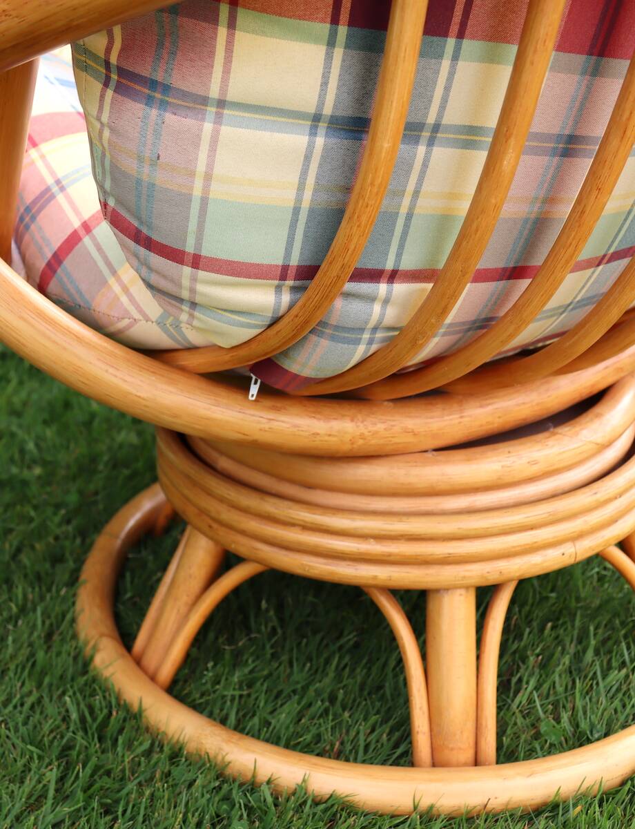 Swivel rattan armchair with matching ottoman