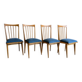 Set of 4 chairs in a minimalist Nordic style.