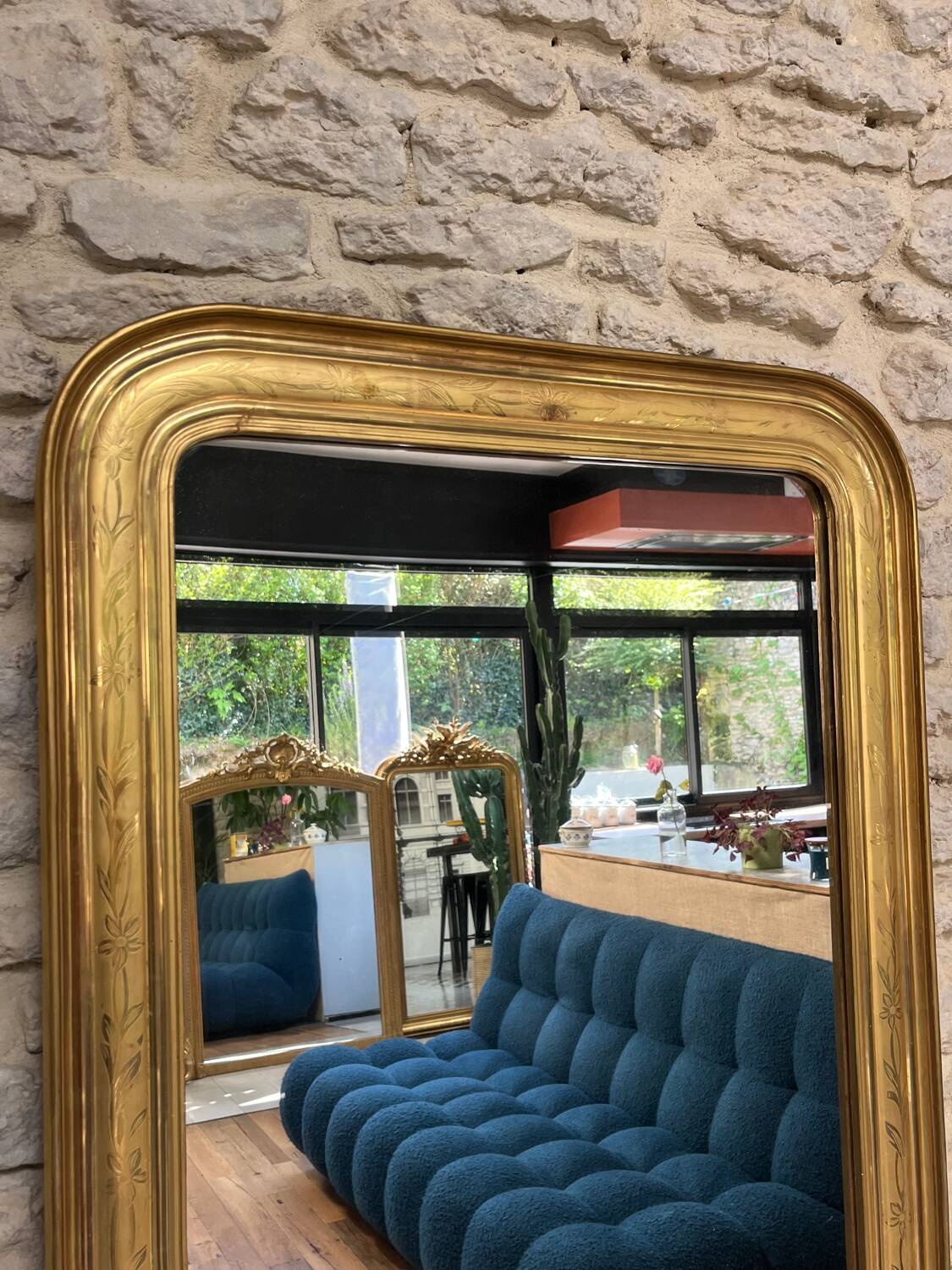 Antique mirror 86.5/69cm Louis-Philippe gilded with gold leaf, engraved decoration.