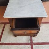 Old wooden marble bedside table