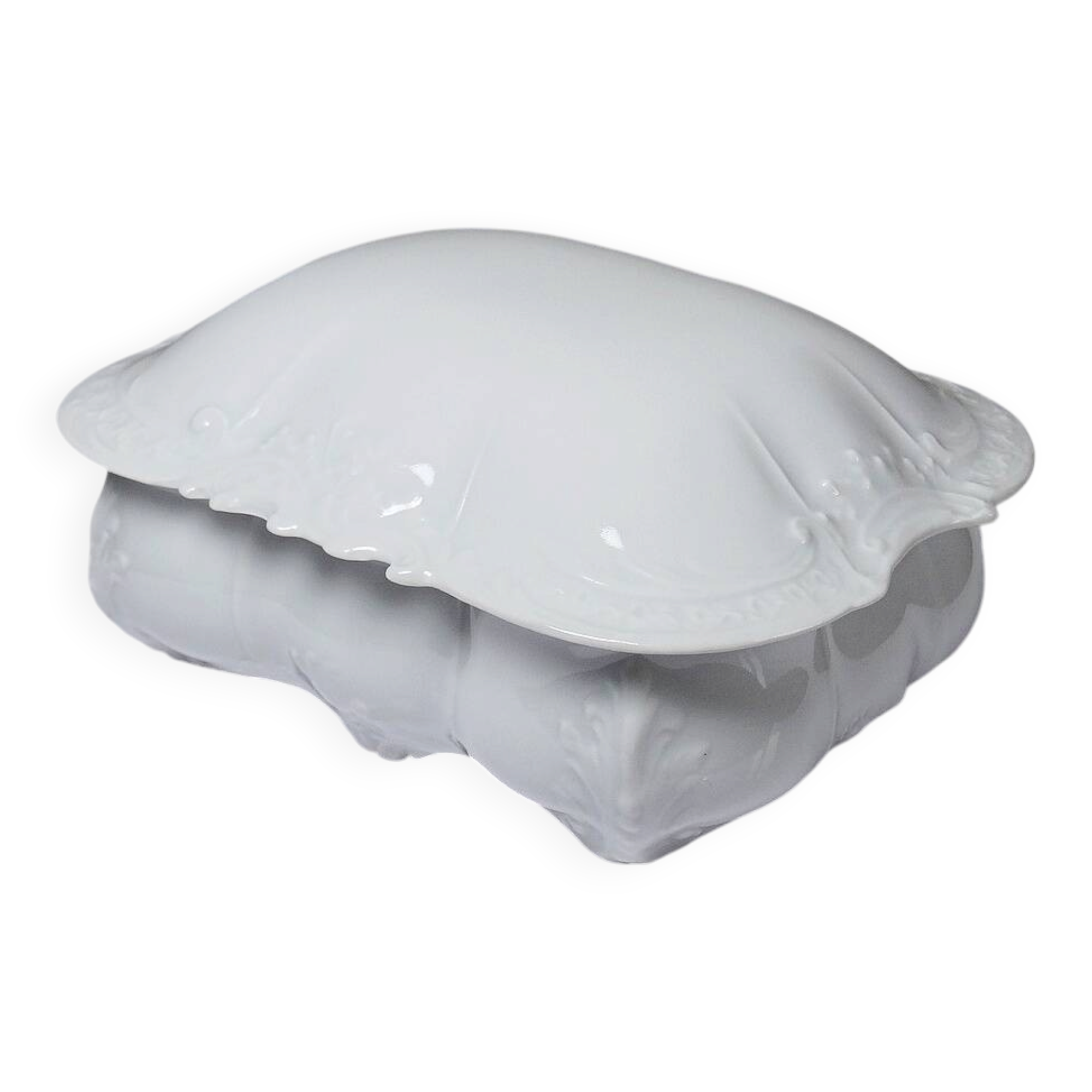 Vintage Limoges porcelain bonbonnière in white with rococo decoration.