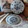 Old plates with blue floral decoration.