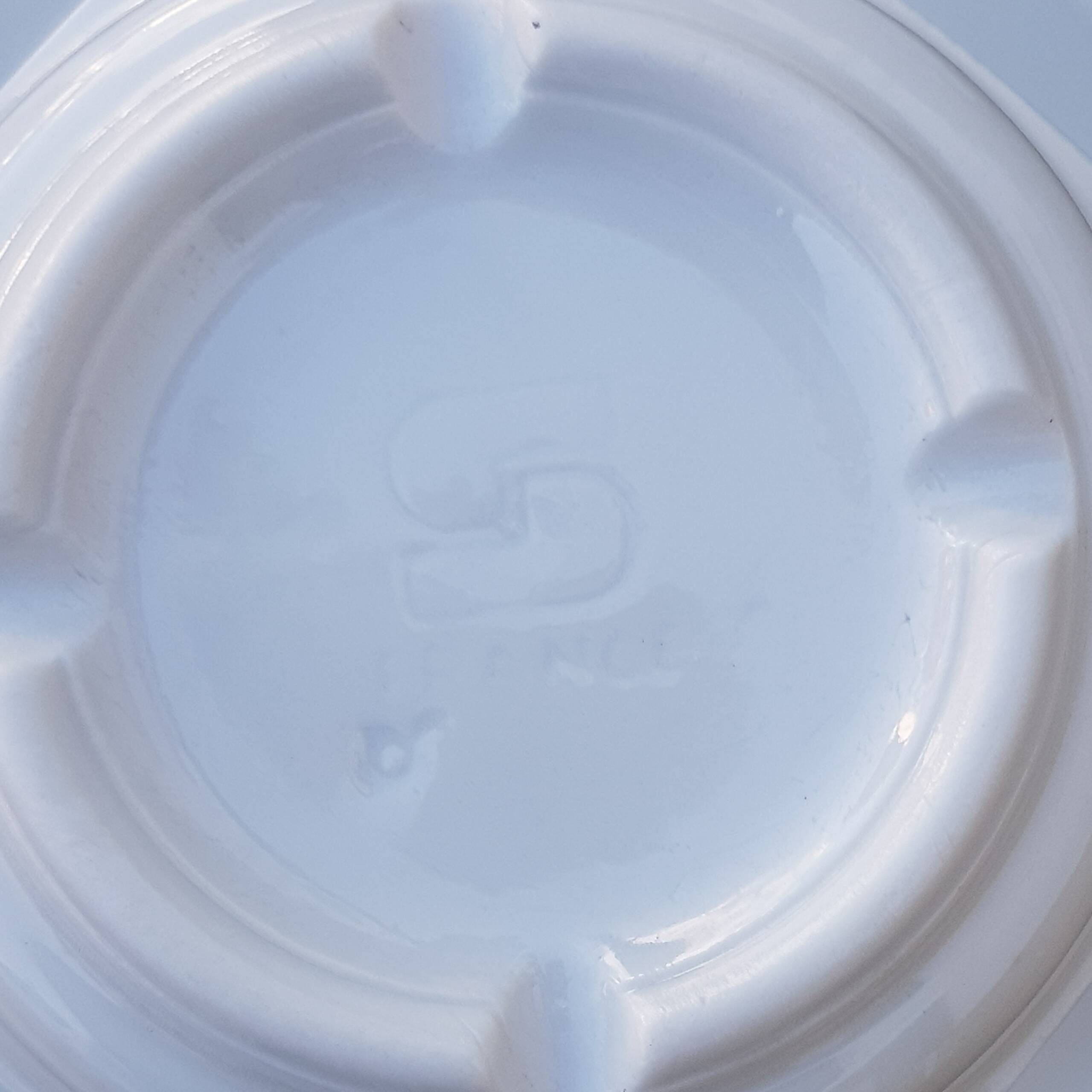 4 White cups and saucers
