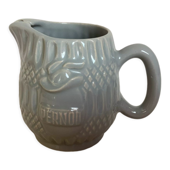 Old pernod pitcher in grey earthenware