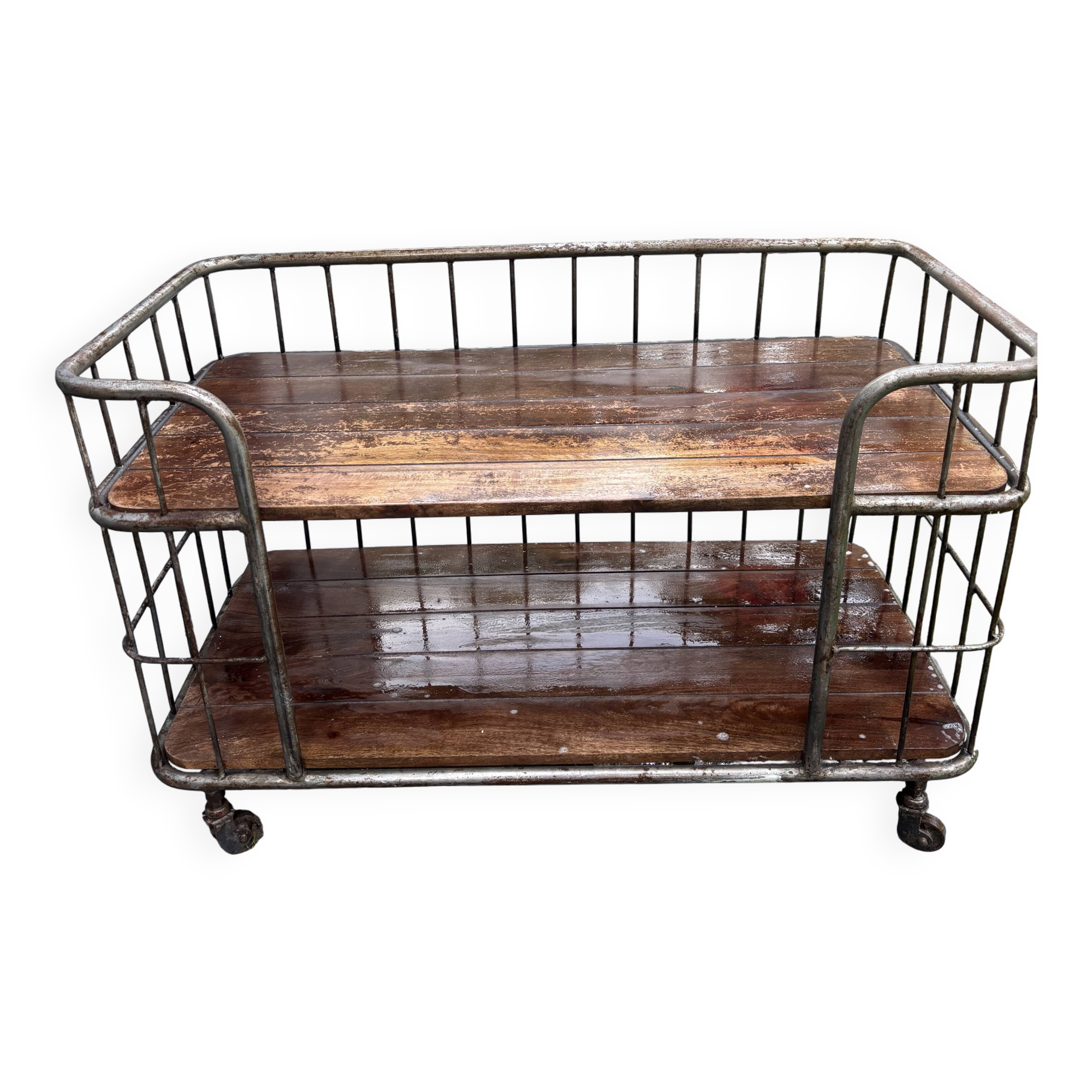 Industrial metal and wood serving trolley on wheels