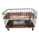 Industrial metal and wood serving trolley on wheels