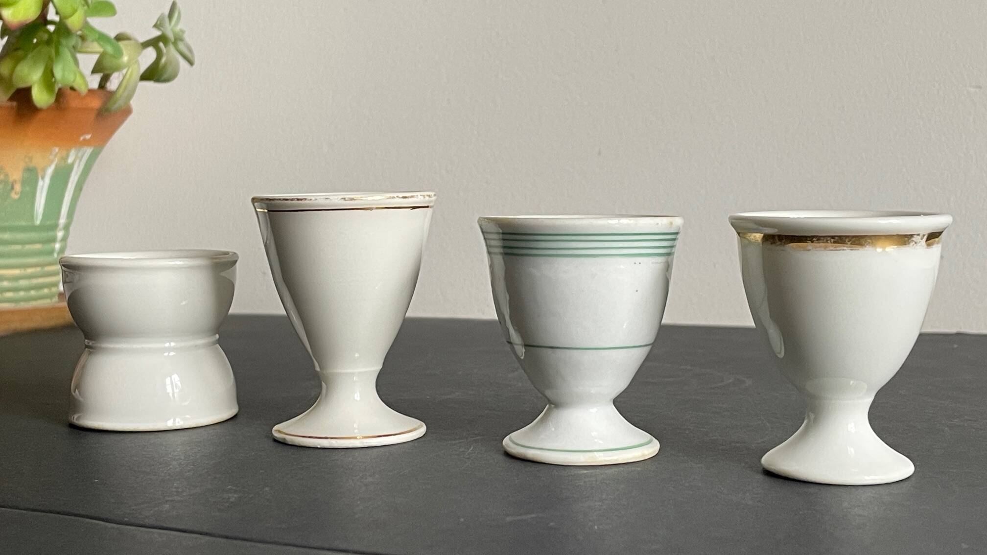 4 antique ceramic egg cups