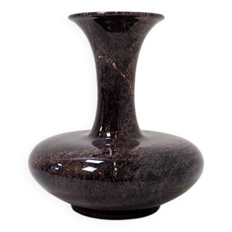Polished granite vase
