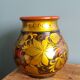 Khokhloma vase, Russian lacquered wood craftsmanship, hand-painted floral decoration.