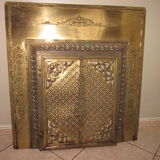 Antique brass fireplace front