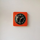 Vintage orange wall clock made of Inproco plastic, 1970