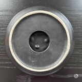 Ceramic pocket emptier 1980