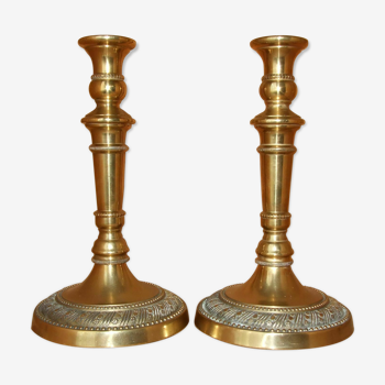 Pair of empire-style candlesticks or gilded bronze restoration