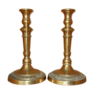 Pair of empire-style candlesticks or gilded bronze restoration