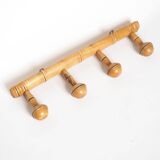 Light wood coat hooks 1900