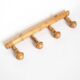 Light wood coat hooks 1900