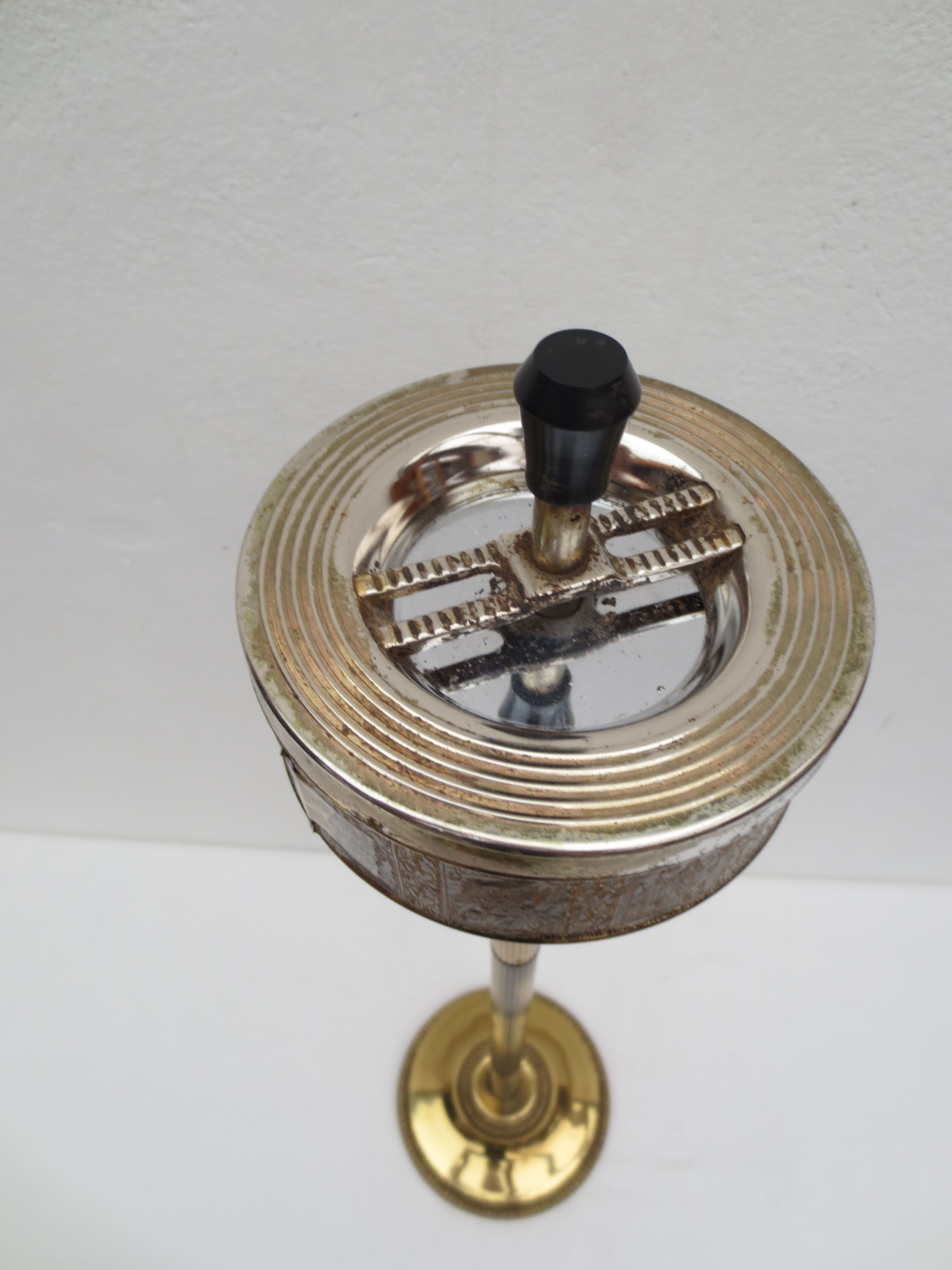 Old ashtray on foot year 50 in gilded brass