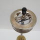 Old ashtray on foot year 50 in gilded brass