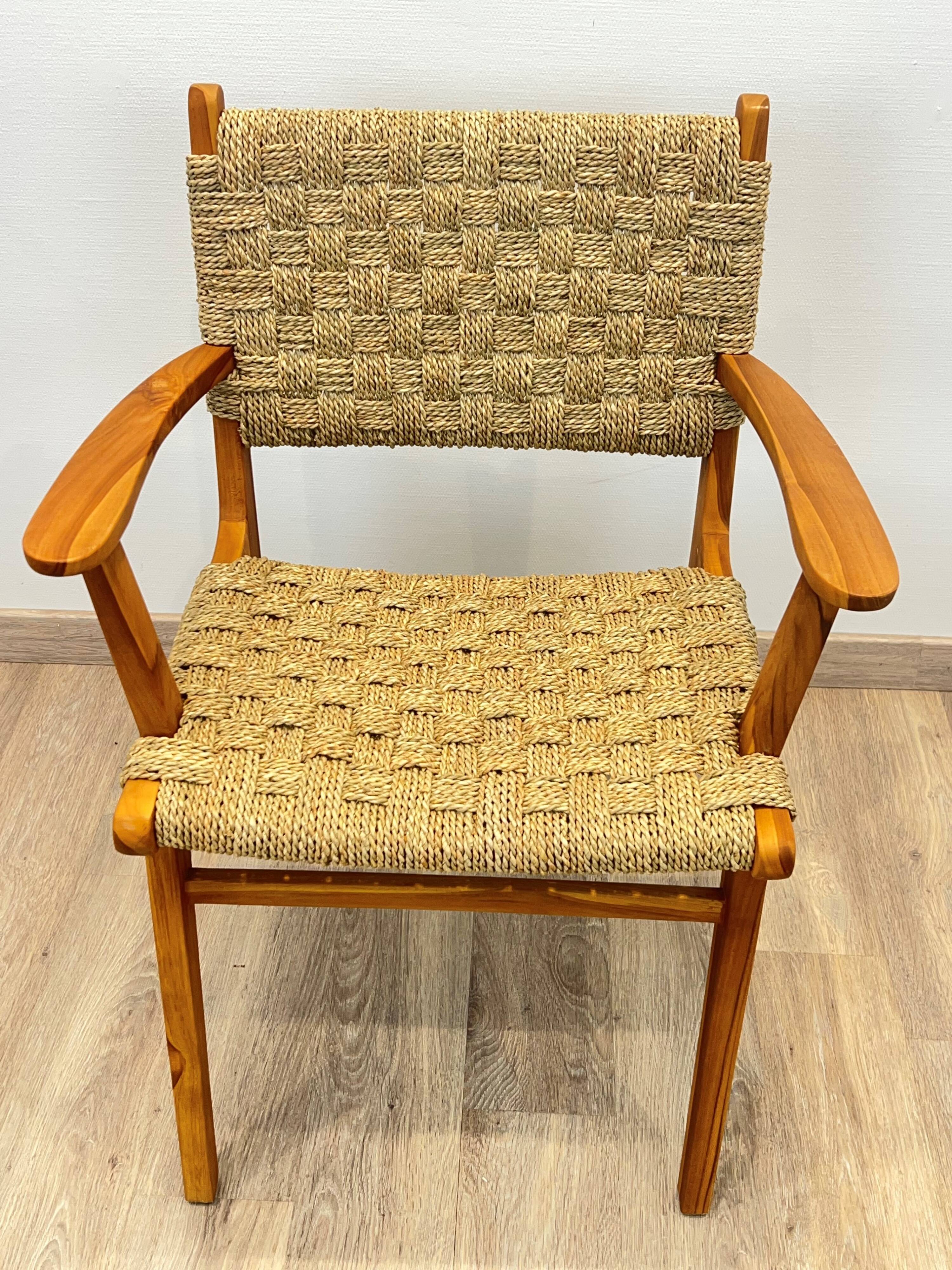 Pair of woven teak armchairs
